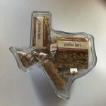 Clear Texas Gift Box With Pecan Praline Bars. Fixed Price $36.80.