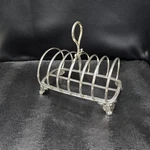 John Gammage Solid Silver Toast Holder. Fixed Price $1254.14.