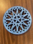 Vtg Trivet Cast Iron Minuteman Int'l Rustic Enameled Round Blue Hearts 7". Fixed Price $13.50.