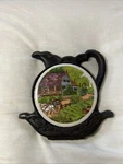 Cast Iron Vintage Trivet American Homestead Summer Ceramic Decor. Fixed Price $12.00.