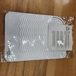 Heat Resistant White Silicone Mat Hair Styling Tool Protector. Fixed Price $6.95.