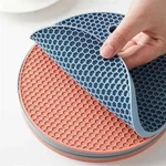 Silicone Heat-resistant Mat Round Non-slip Coaster Pot Holder Kitchen Tool. Fixed Price $11.99.