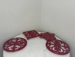 Lot 4 Total- 2 Red Cast Iron Fleur De Lis 8 X Two Addition Trivets. Fixed Price $49.99.
