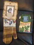 Home Trends Kitchen Pot Holder And Oven Mitt - Elements Tie Towel. Fixed Price $15.00.