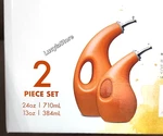 Rachael Ray Evoo & Vinegar 2PC. Bottle Set White 24 13OZ Orange Glaze Ceramics. Fixed Price $49.00.