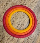 Rachael Ray 3 Silicone Trivets Red Orange Yellow 500 F Heat Resistant. Fixed Price $7.99.