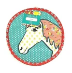 The Pioneer Woman Quilted Horse Trivet 10" Diameter. Fixed Price $14.95.