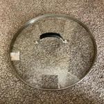 Cooking With Calphalon Tempered Glass 12 Replacement Lid Only Silicone Grip. Fixed Price $15.00.