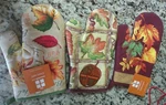 New 3 Count Essential Home Vintage Fall Oven Mitts. Fixed Price $18.00.