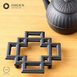 Oigen Cast Iron Bottle Trivet (karahana Floral Motif). Fixed Price $47.00.