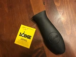 Lodge Silicone Hot Cover For Cast Iron Assist Handles - New (black). Fixed Price $23.95.
