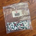 Longaberger Holiday Gripper Basket Liner Holly Berry Pattern New. Fixed Price $10.00.