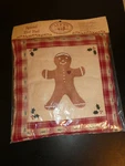Alices Cottage Spiced Hot Pad Ginger Bread Man New Seal 9 X. Fixed Price $12.00.