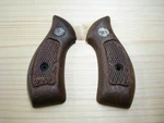 Smith & Wesson Model 36 38 Spl. Revolver Factory Wooden Grip Set Round Butt. Fixed Price $79.98.