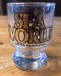 Sea World Shot Glass Orlando Florida 1976 Amusement Park Shamu Orca Killer Whale. Fixed Price $9.99.