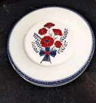 Liberty Home Of Four Plates Patriotic Table Setting, Red Floral Blue Rim. Fixed Price $39.99.