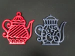 Transpac Red Blue Teapot Shaped Metal Iron Kitchen Trivet Set Of 2. Fixed Price $6.99.