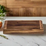 Three-in-one Tray, Trivet And Bread Crumb Catcher. Fixed Price $57.99.