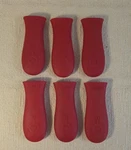 6 Lodge Silicone Hot Handle Holder Red Cast Iron Skillets. Fixed Price $24.00.