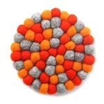 Hand Crafted Felt Ball Trivets From Nepal: Round Chakra, Oranges - Global Groov. Fixed Price $22.00.