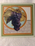 Trivet Hallmark / Grapes Sitting On Counter Or Hanging 8" X 1". Fixed Price $8.00.